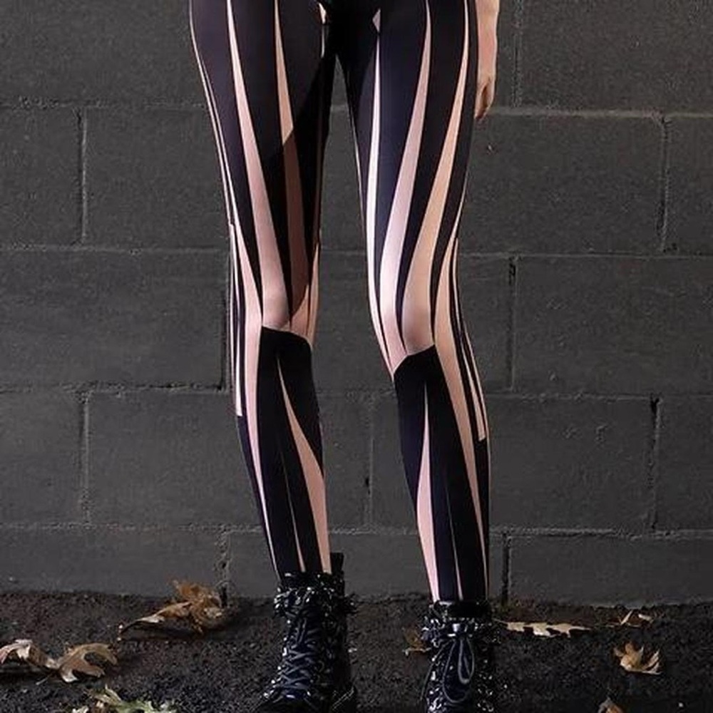 Jamie Okuma black & tan tights XL.